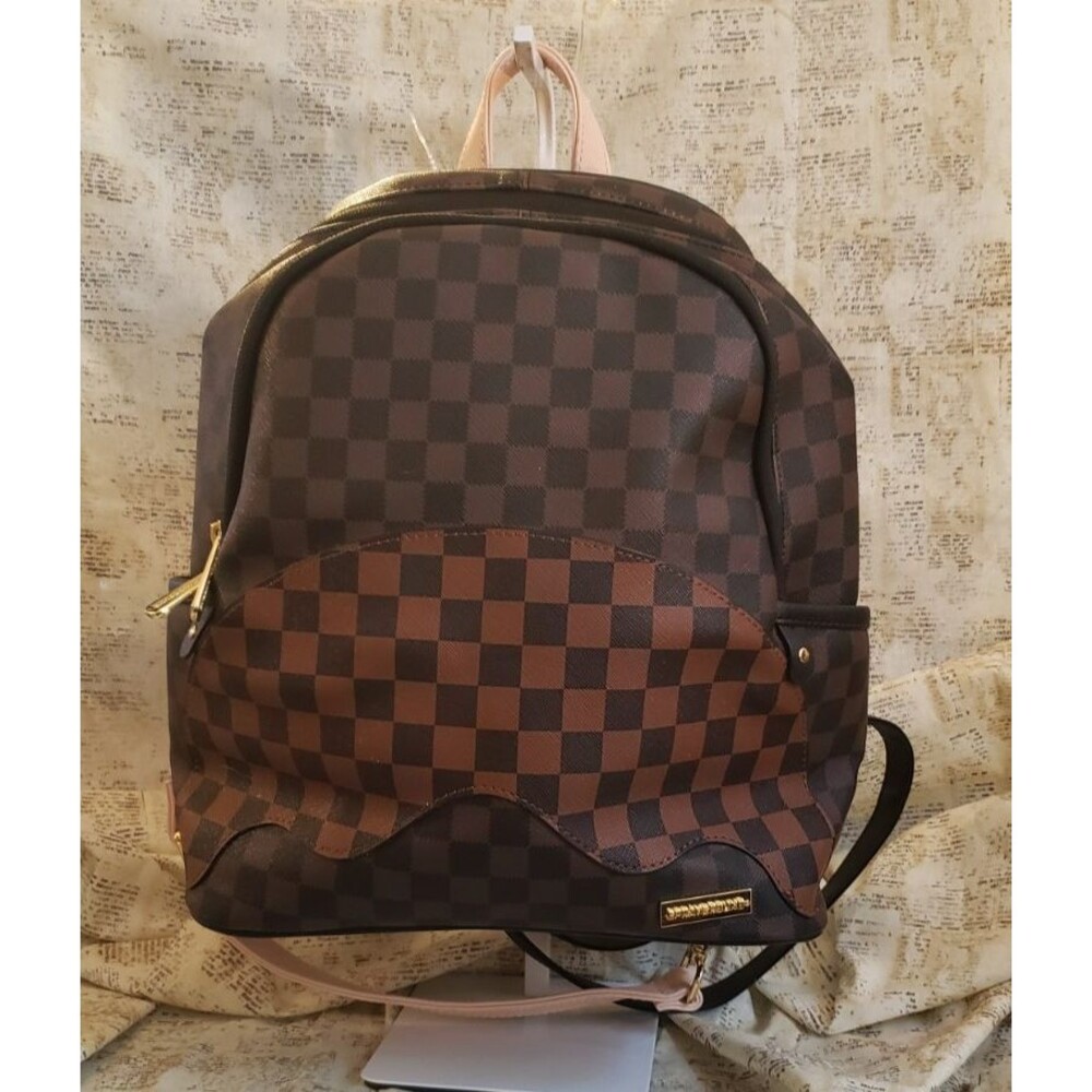 Quirky, Artsy, Unique - Sprayground Checkered Backpack - Black and Pink Straps